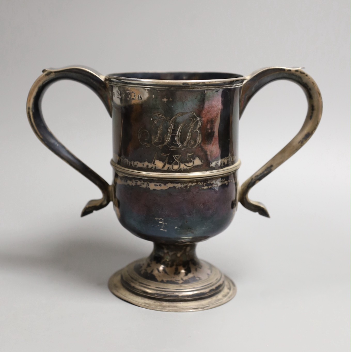 A George III provincial silver two handled pedestal cup by Dorothy Langlands, Newcastle, 1809, with later engraved initials and date, height 14.5cm, 11.9oz.